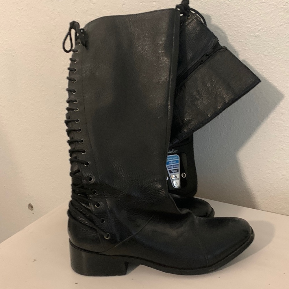 Two lips lace up knee high boots